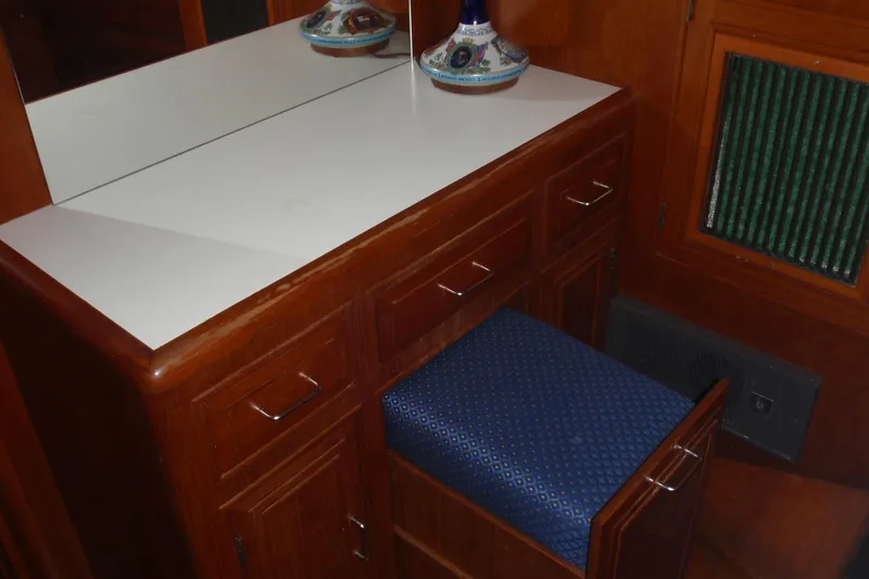 Slide: The Image of 1985 Ocean Alexander Europa Slide out Seat, Mirror and Storage - 60