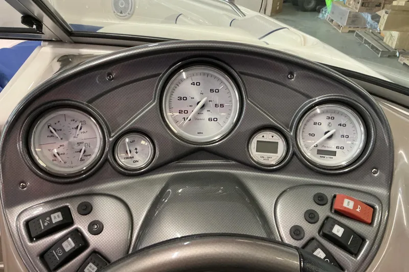 Slide: The Image of Dashboard of a 2008 Rinker 226 Captiva Bowrider with gauges and controls. - 12