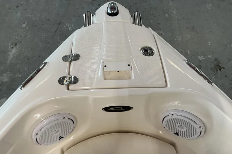 Slide: The Image of 2008 Rinker 226 Captiva Bowrider boat bow with speakers and storage compartment. - 28
