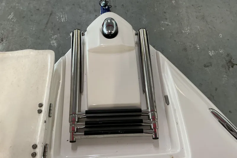 Slide: The Image of 2008 Rinker 226 Captiva Bowrider swim platform with folded stainless steel ladder. - 29