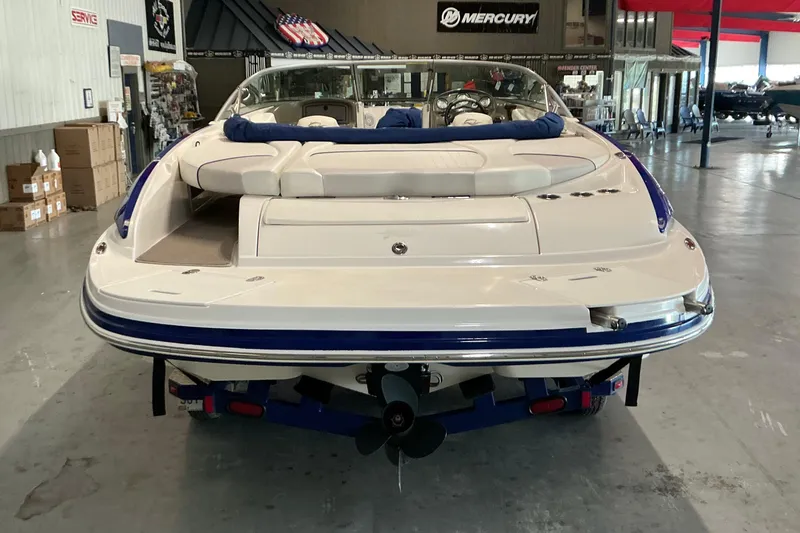 Slide: The Image of 2008 Rinker 226 Captiva Bowrider boat in showroom, rear view. - 3