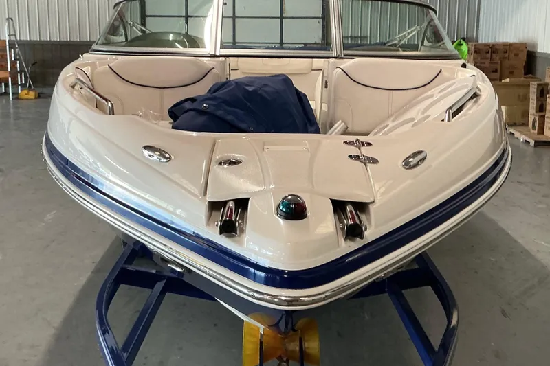 Slide: The Image of 2008 Rinker 226 Captiva Bowrider boat in storage, front view. - 7