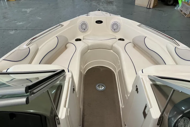 Slide: The Image of 2008 Rinker 226 Captiva Bowrider interior with spacious seating and modern design. - 9
