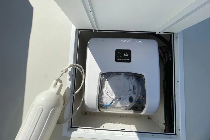 Slide: The Image of Seakeeper stabilizer installed on 2016 Parker 2510 XL Walkaround boat. - 12