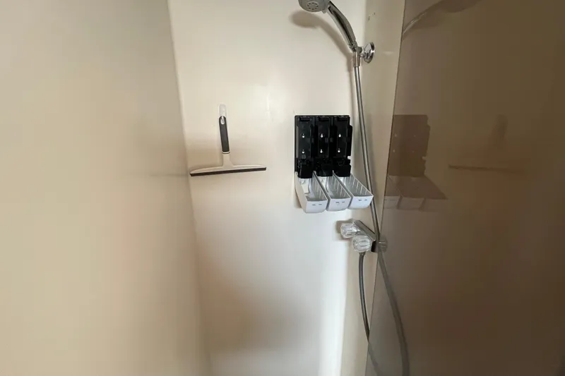 Slide: The Image of Shower area with squeegee and dispenser on Durbeck 50, 1983 model. - 22