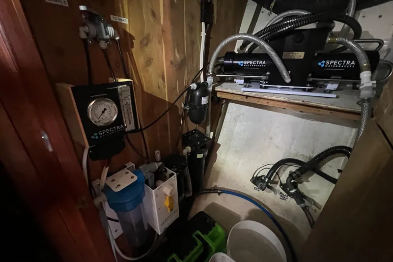 Slide: The Image of Water filtration system in a 1983 Durbeck 50 yacht, featuring Spectra Watermakers equipment. - 31