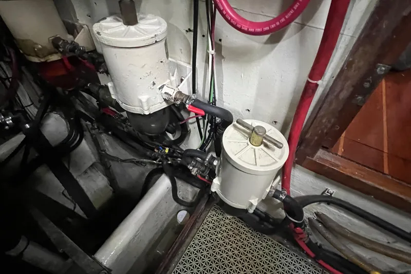 Slide: The Image of Engine room of 1983 Durbeck 50 yacht with fuel filters and hoses. - 34