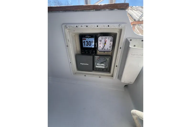 Slide: The Image of Control panel on a 1983 Durbeck 50 boat featuring Raymarine instruments. - 45