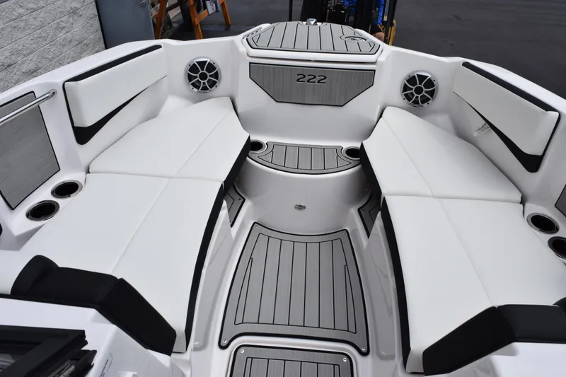 Slide: The Image of Interior view of 2026 Yamaha Boats 222S, featuring sleek white seating and modern design. - 12