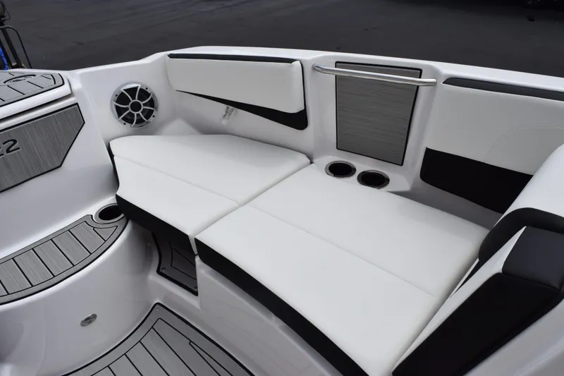 Slide: The Image of Interior of 2026 Yamaha Boats 222S, featuring sleek white seating and modern design elements. - 13