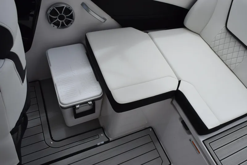 Slide: The Image of Interior of 2026 Yamaha Boats 222S, featuring white seating and integrated cooler. - 14