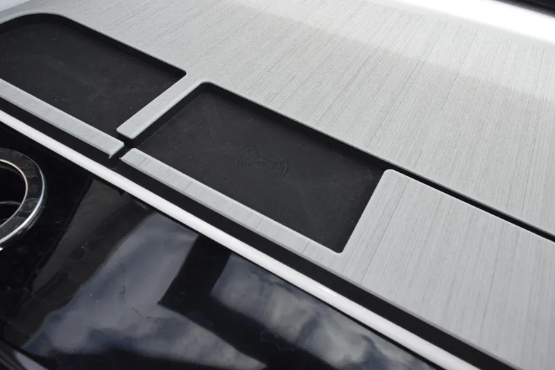 Slide: The Image of 2026 Yamaha Boats 222S dashboard with sleek, modern design and metallic finish. - 16