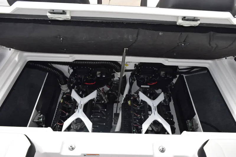 Slide: The Image of Engine compartment of 2026 Yamaha Boats 222S, showcasing dual engines and sleek design. - 20