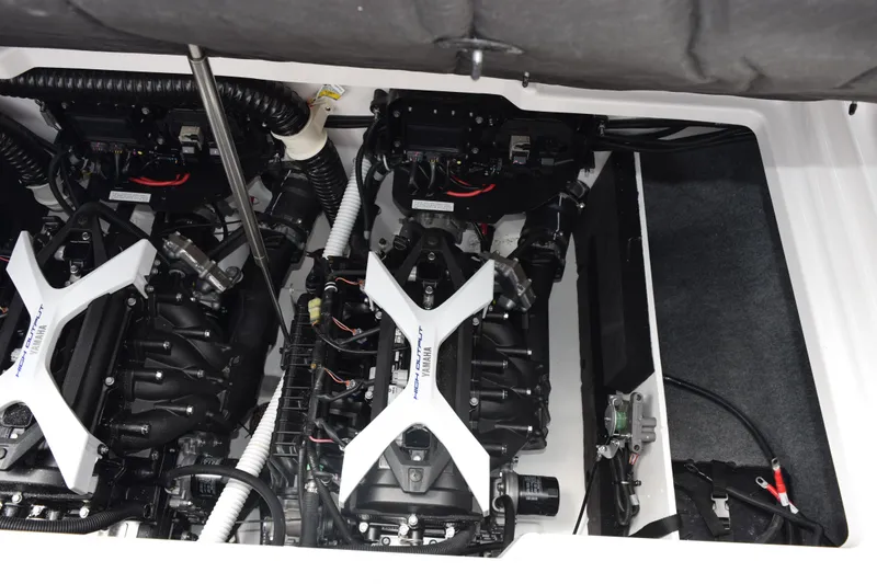 Slide: The Image of Engine compartment of 2026 Yamaha Boats 222S, showcasing dual high-output engines. - 21