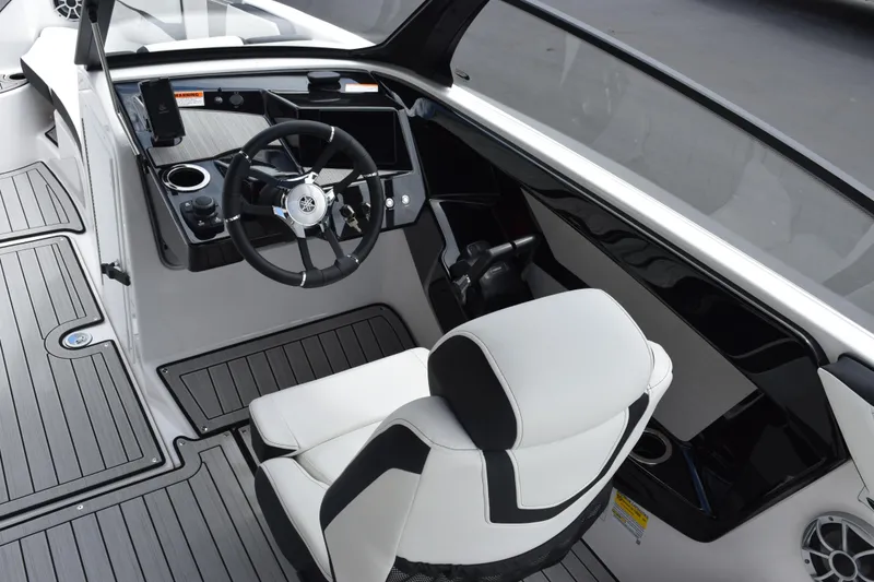 Slide: The Image of 2026 Yamaha Boats 222S cockpit with modern steering and seating design. - 8