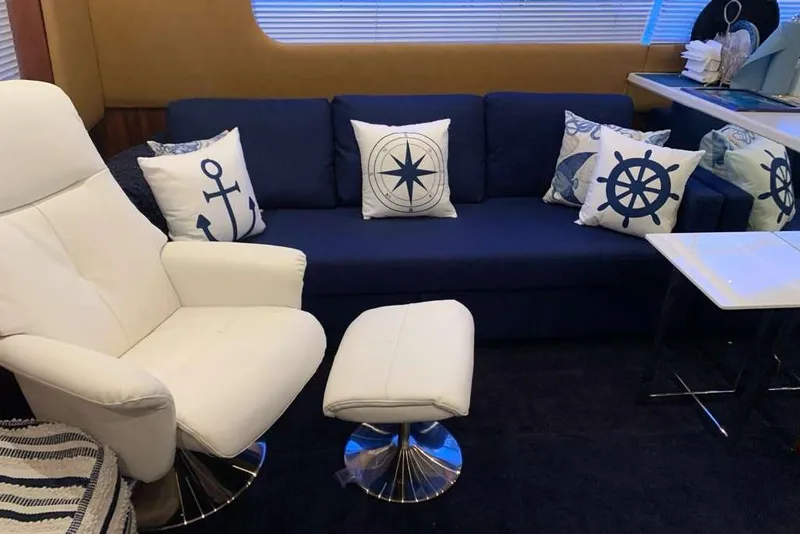Slide: The Image of Interior of 1995 Ocean Yachts 42 Super Sport with nautical-themed decor and seating. - 11