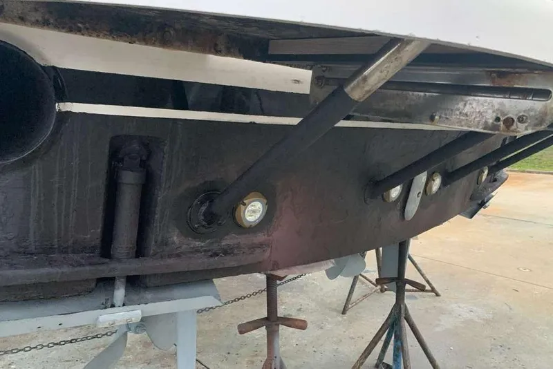 Slide: The Image of 1995 Ocean Yachts 42 Super Sport boat hull on stands, showing underside details. - 26