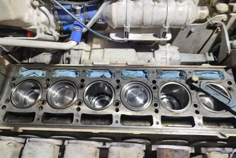 Slide: The Image of Engine block of a 1995 Ocean Yachts 42 Super Sport, showcasing pistons and cylinders. - 36