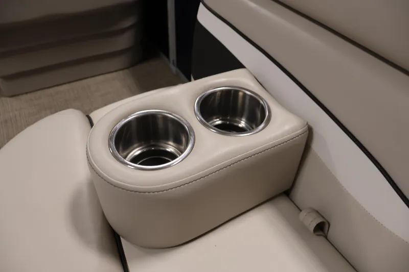 Slide: The Image of Cup holders on beige seating in 2019 Bennington 20 SL boat interior. - 13