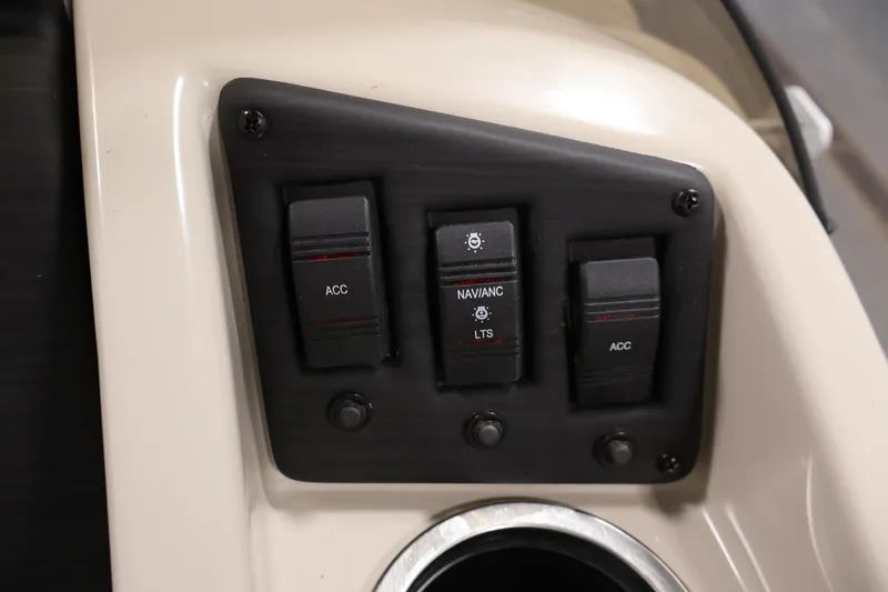 Slide: The Image of Control panel of a 2019 Bennington 20 SL boat with accessory switches. - 24