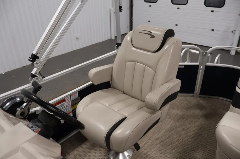 Slide: The Image of Captain's chair in 2019 Bennington 20 SL pontoon boat interior. - 27