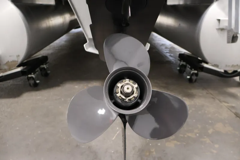 Slide: The Image of Close-up of a 2019 Bennington 20 SL boat propeller in a garage setting. - 37