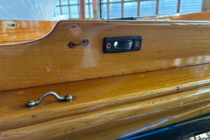 Slide: The Image of Close-up of 1982 Herreshoff 12.5 footer's polished wooden interior detail. - 34