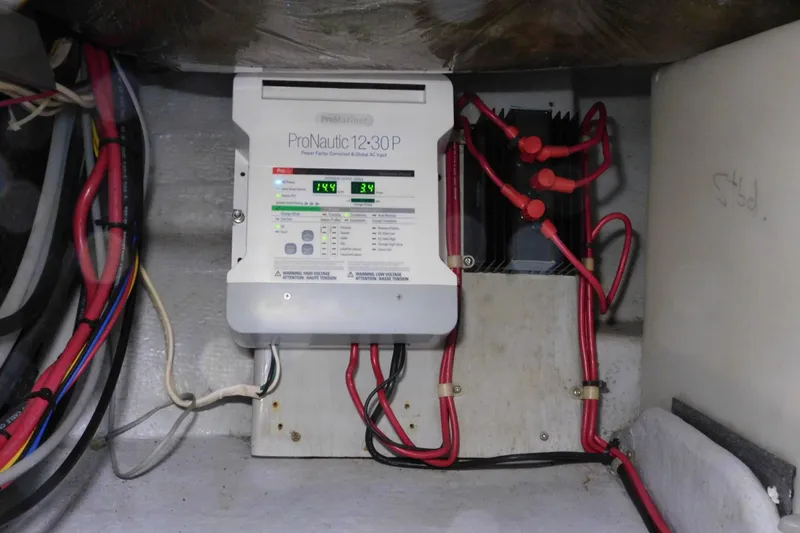 Slide: The Image of Electrical system of a 2000 Camano Troll boat featuring a ProNautic 12-30P charger. - 36