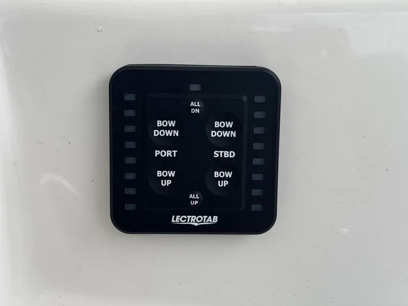 Slide: The Image of Control panel for Lectrotab trim tabs on a 2025 Defiance Catalina 240 boat. - 28