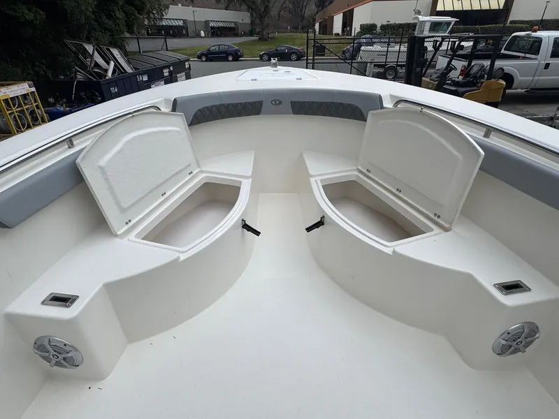 Slide: The Image of 2025 Defiance Catalina 240 boat interior with open storage compartments. - 33
