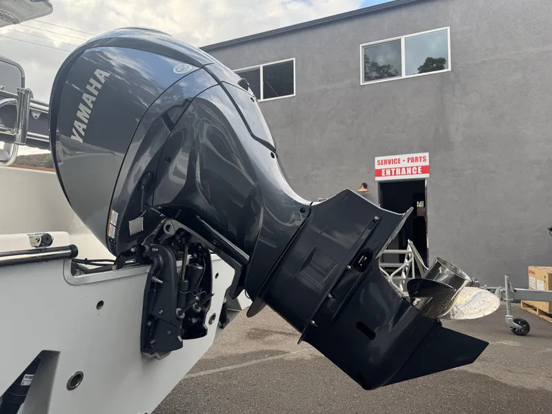 Slide: The Image of Yamaha outboard motor on 2025 Defiance Catalina 240 boat, near service entrance. - 8