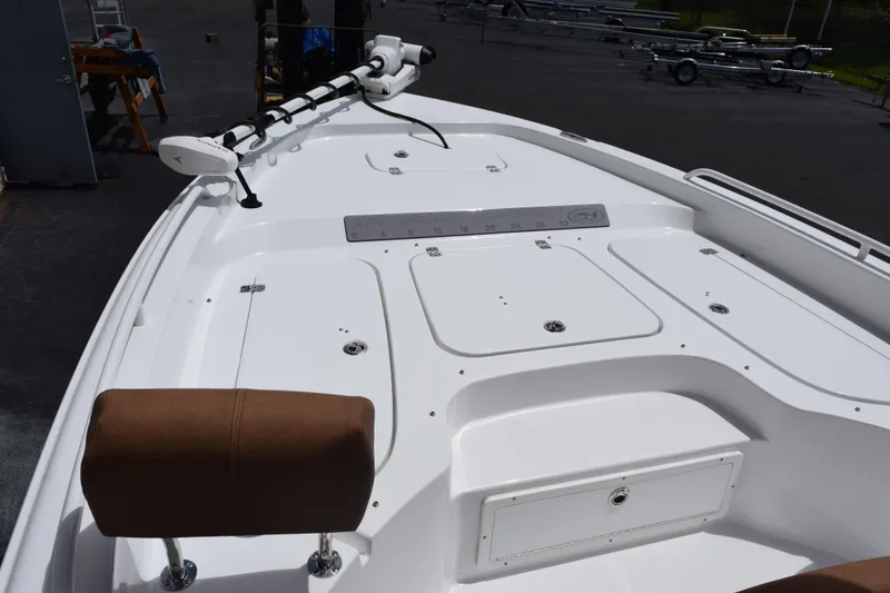 Slide: The Image of 2024 Sea Hunt BX 25 FS boat deck with seating and storage compartments. - 12