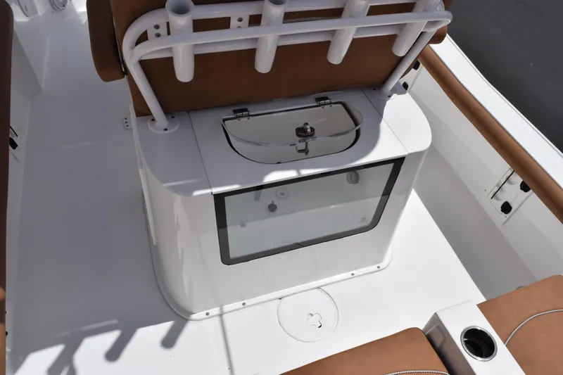 Slide: The Image of 2024 Sea Hunt BX 25 FS boat interior with seating and storage compartment. - 8