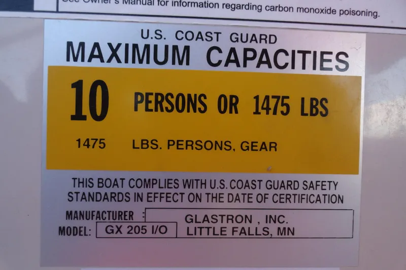 Slide: The Image of U.S. Coast Guard capacity label for 2000 Glastron GX 205 boat, 10 persons or 1475 lbs. - 10