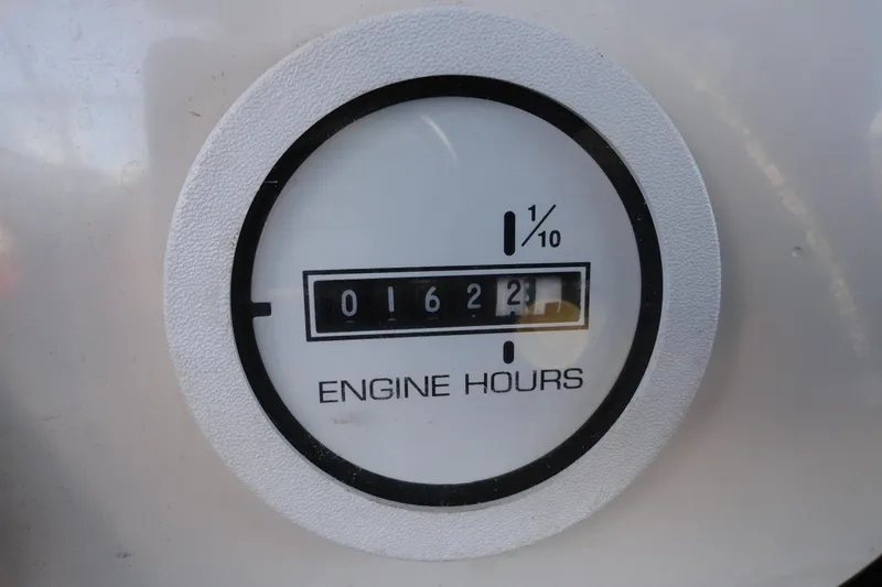 Slide: The Image of Engine hour meter showing 162.3 hours on a 2000 Glastron GX 205 boat. - 15