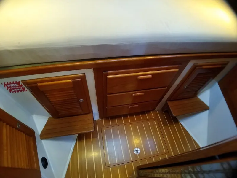 Slide: The Image of 1998 Pacific Seacraft 40 forward cabin storage - 17