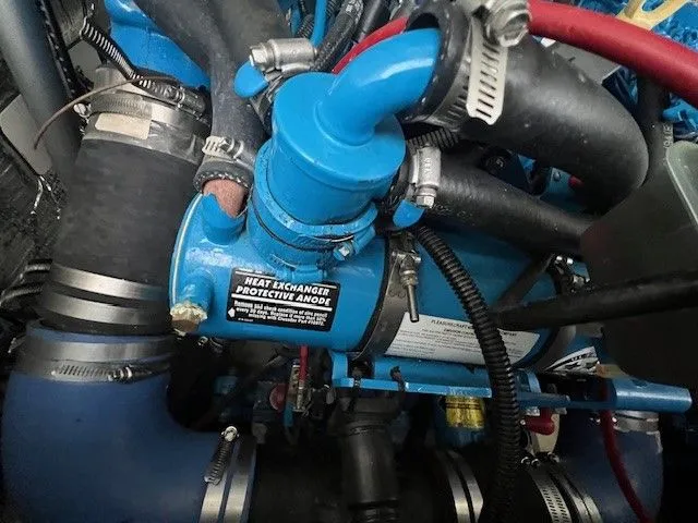 Slide: The Image of Close-up of a 2006 Carolina Classic 28FT engine component. - 14