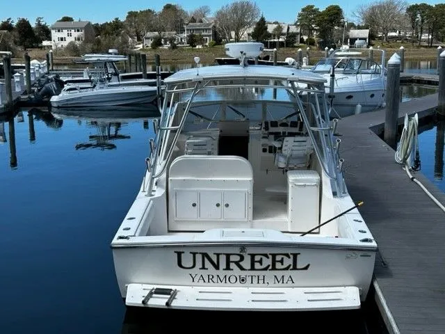 Slide: The Image of 2006 Carolina Classic 28FT boat docked in Yarmouth, MA harbor. - 20