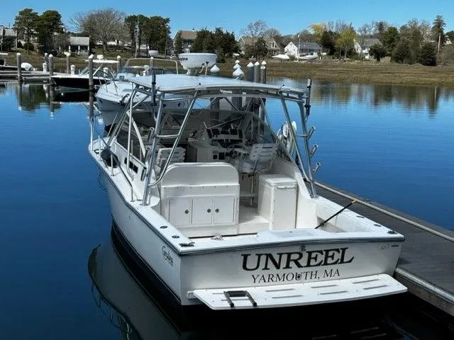 Slide: The Image of 2006 Carolina Classic 28FT boat docked in Yarmouth, MA harbor. - 21
