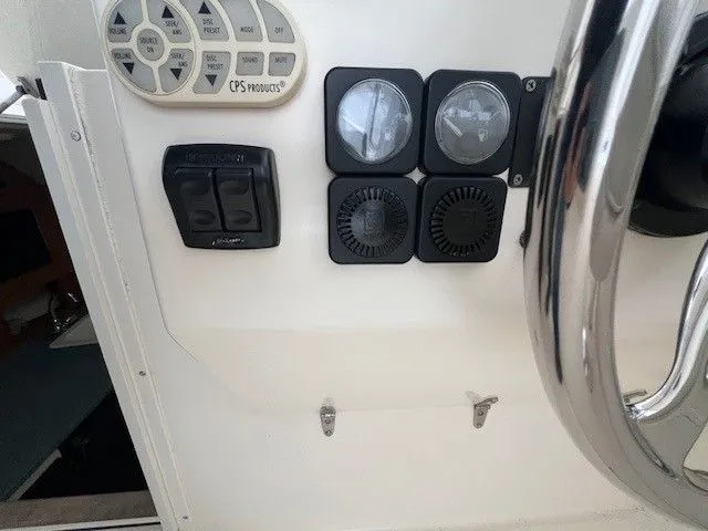 Slide: The Image of Control panel of a 2006 Carolina Classic 28FT boat. - 37