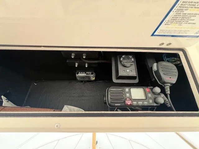 Slide: The Image of Electronics compartment of a 2006 Carolina Classic 28FT boat. - 38