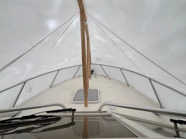 Slide: The Image of 2006 Carolina Classic 28FT boat under cover. - 39