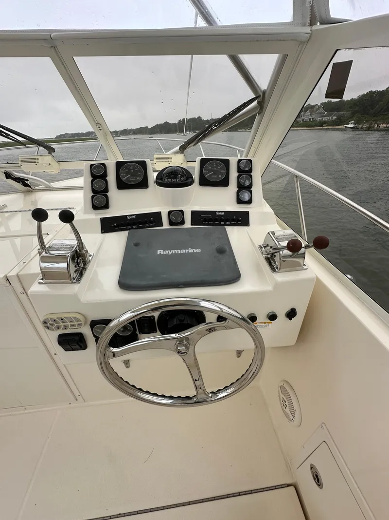 Slide: The Image of Helm of a 2006 Carolina Classic 28FT boat. - 4