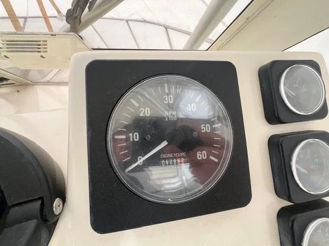 Slide: The Image of Tachometer of a 2006 Carolina Classic 28FT boat, showing 428 hours. - 40