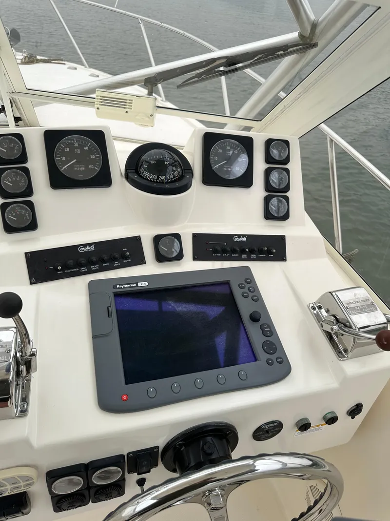 Slide: The Image of Control console of a 2006 Carolina Classic 28FT boat. - 5