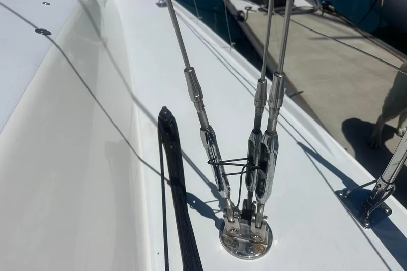 Slide: The Image of Bow of a 2004 J Boats J/109 sailboat docked in a marina. - 20