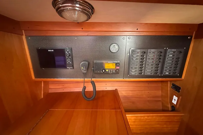 Slide: The Image of Control panel of a 2004 J Boats J/109 sailboat with navigation and communication equipment. - 51