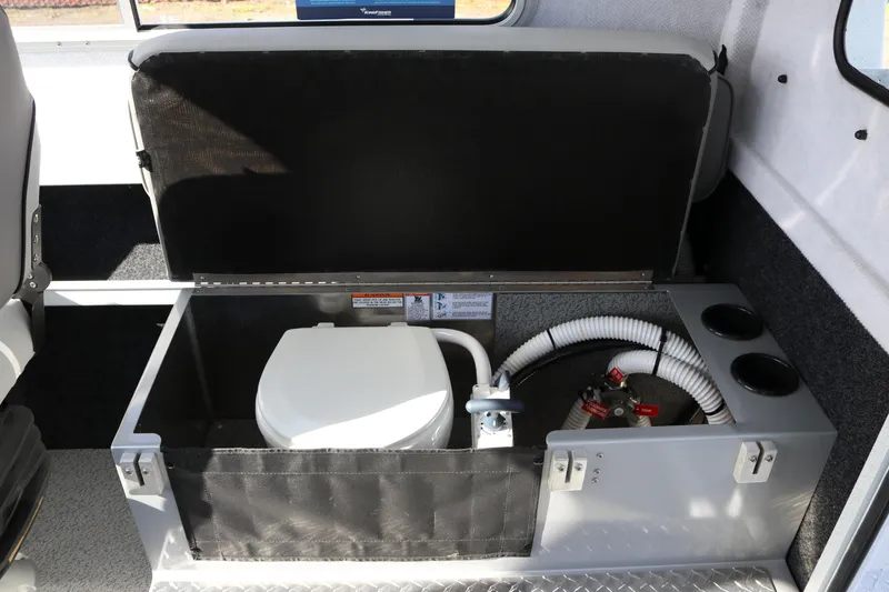 Slide: The Image of 2026 KingFisher 2425 Escape HT boat interior with built-in toilet and plumbing system. - 15