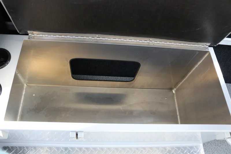 Slide: The Image of Open storage compartment in 2026 KingFisher 2425 Escape HT boat. - 17