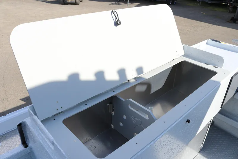 Slide: The Image of Open storage compartment on 2026 KingFisher 2425 Escape HT boat. - 24